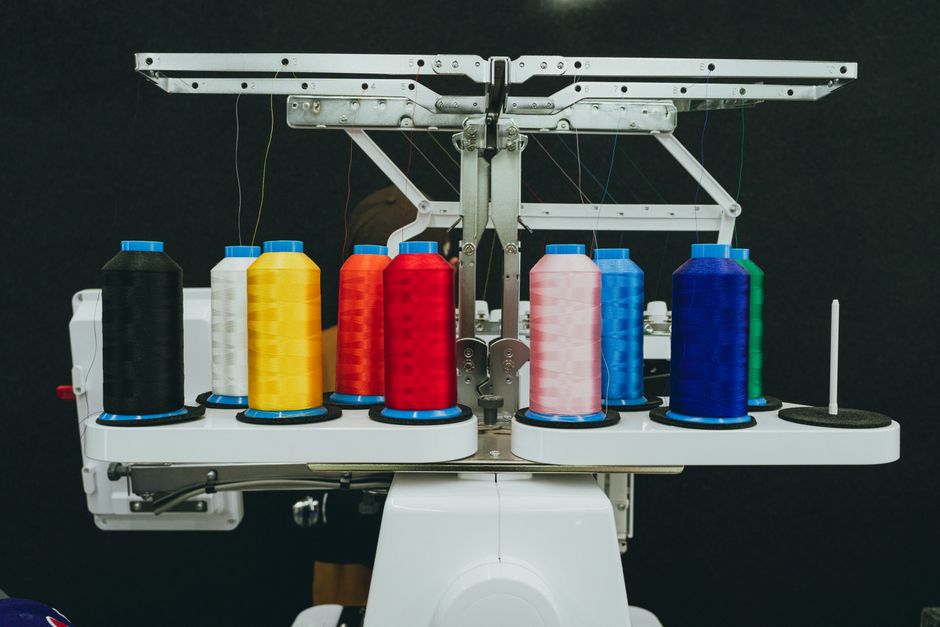 Professional embroidery machine threadwork in a production setting